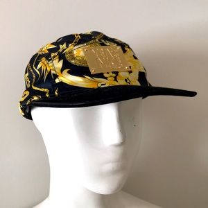 Yea. Nice Black and Gold 5-Panel Hat with metal gold plate